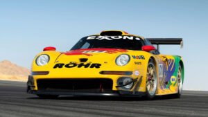 Porsche GT1 racer passes the block with Broad Arrow at Monterey